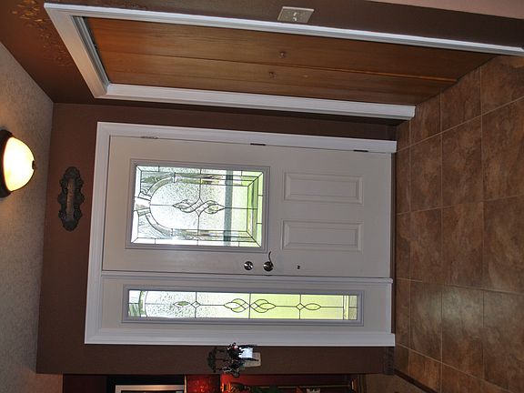 Sorry for sideways pics. New door & tiled entry