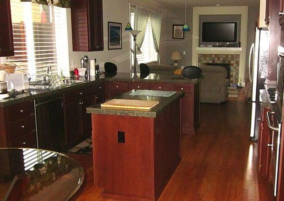 Gourmet kitchen with granite counters and stainless appliances!