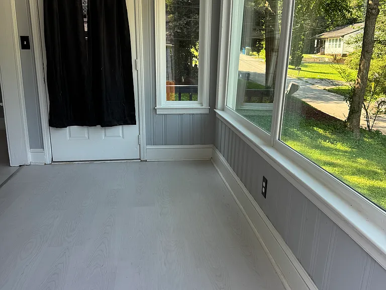Entry way to the house with Glass porch