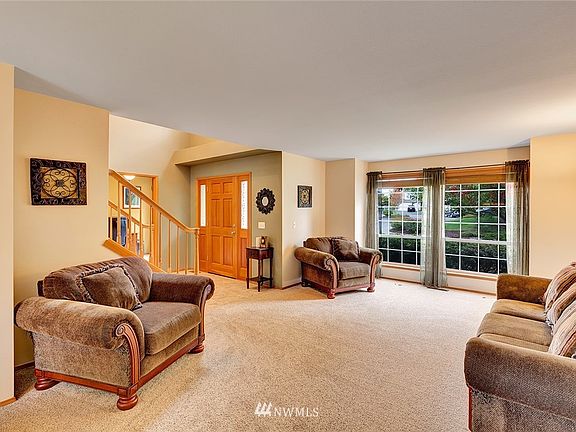 Spacious light filled formal living room.