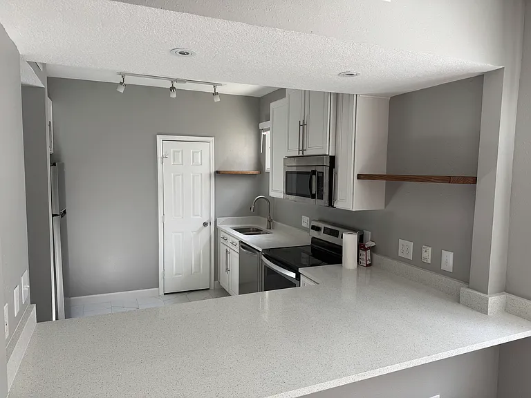 Open kitchen with dine-up bar