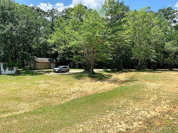Side of home gravel driveway