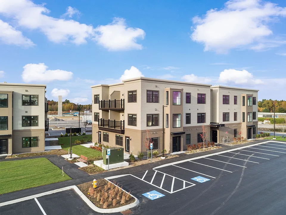 Blue skies, manicured grounds, and modern livingThe Parker welcomes you home.
