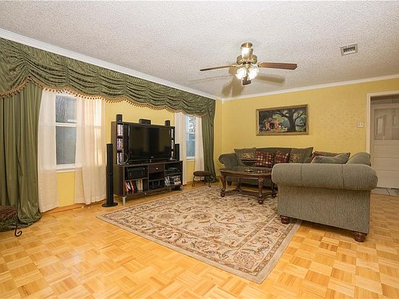 Spacious living room and view from front entry