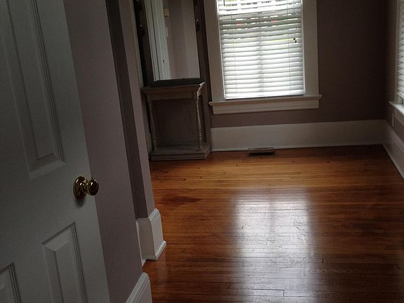 View from kitchen to eating area. Half bath door on the left.