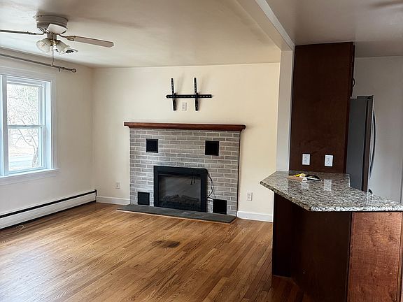 Living room with electric fireplace.