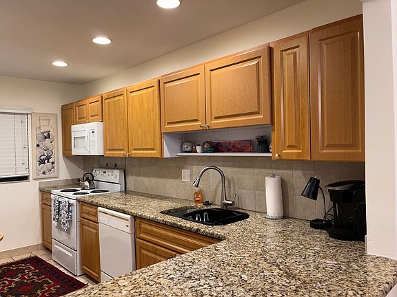 Kitchen with granite countertops