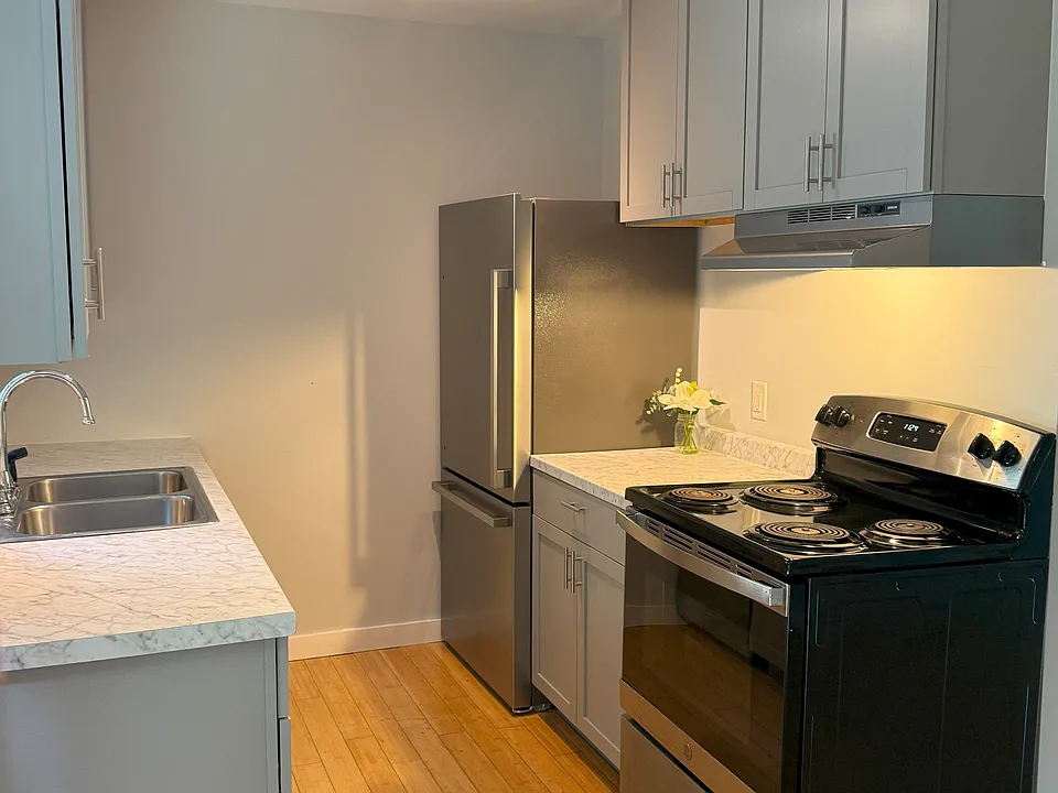 Fully updated kitchen with ceiling-height cabinets for lots of storage