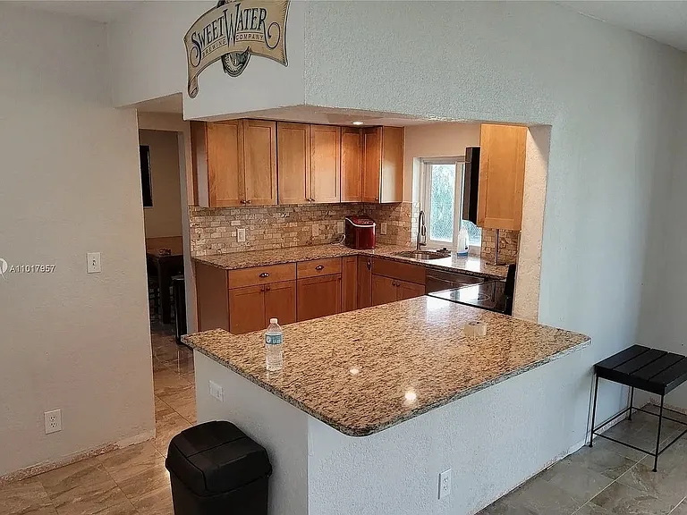 9240 NW 12th Ave — Photo 11