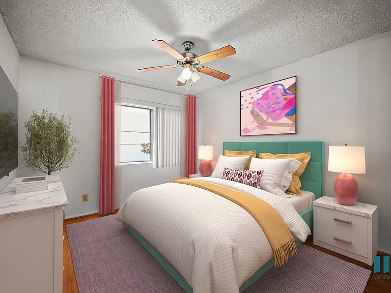 Bedroom with a Ceiling Fan and Vinyl Flooring