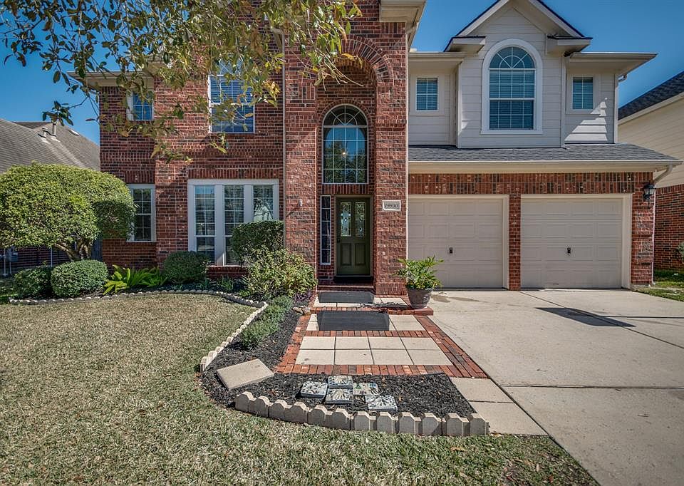 Welcome to 19930 Letchfield Hollow Drive, located on a greenbelt this home offers so many amazing features.