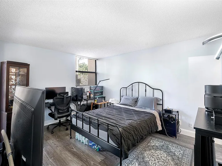 8437 Forest Hills Dr #203 — Photo 14