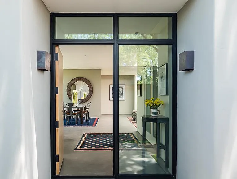 Front door; notice steel cladding above entrance