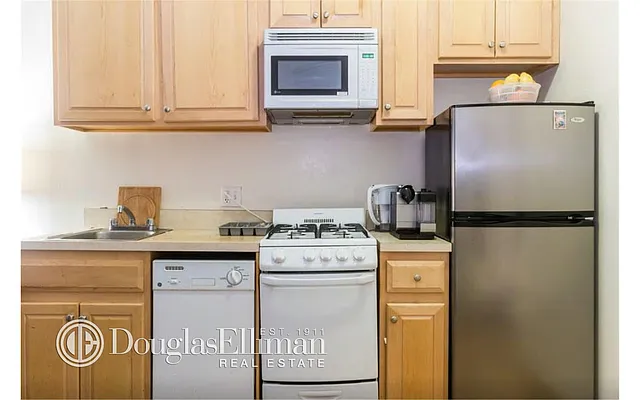 Rented by Douglas Elliman | media 13