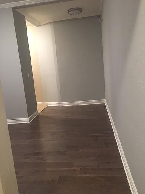 New hardwood flooring and crown Molding. Painted the new hip
