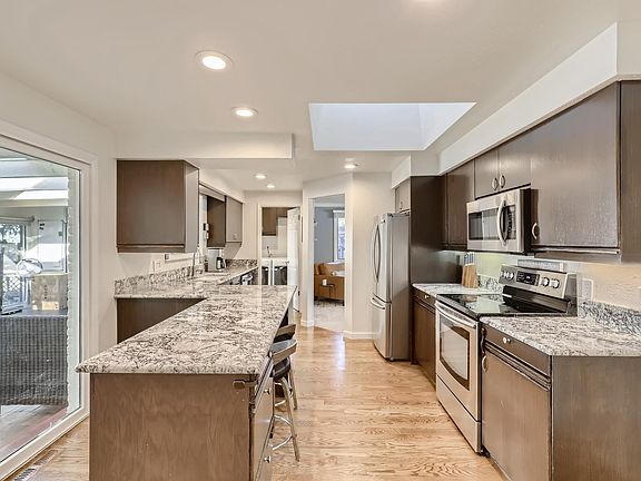 Kitchen with Granite Countertops and Stainless Steel Appliances