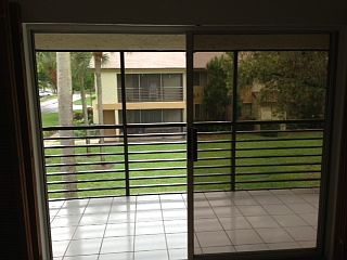 1st image of 610 Gardens Dr APT 203