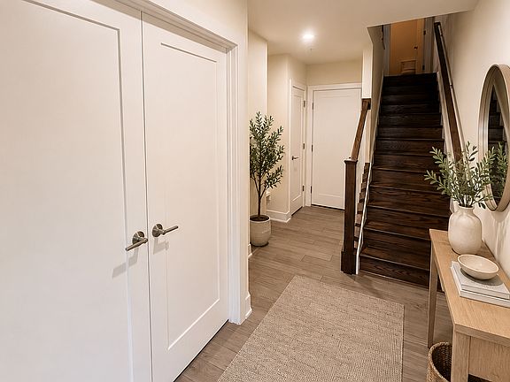 Foyer with access to flex room/office, front entrance, attached garage entrance, and coat closet.