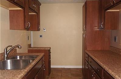 New cabinets in this totally functional galley kitchen...