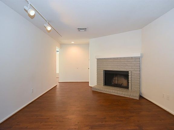 Corner fireplace is the focal point of your living area.