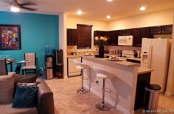 Open kitchen overlooking Family room