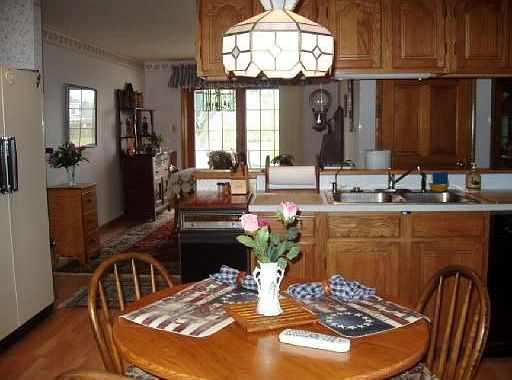 Eat-in kitchen overlooks formal dining room
