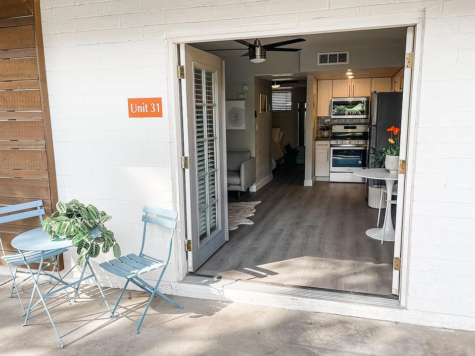 Beautiful French Doors Open Up To A Sparkling Pool.