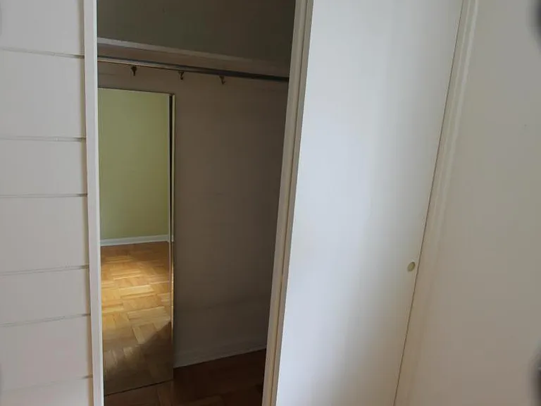 Master bedroom closet with full size mirror
