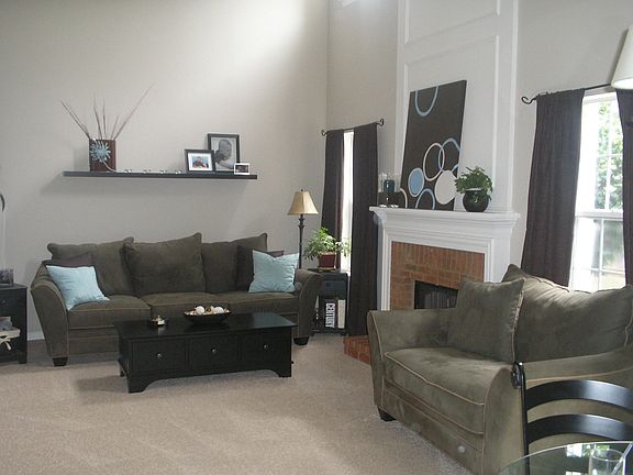 2 story great room with brick fireplace