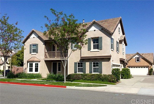 Exterior Front with direct-access garage from the side