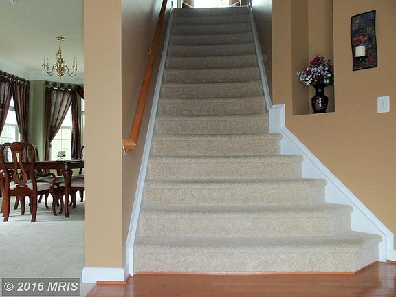 Foyer and stairs to upper level
