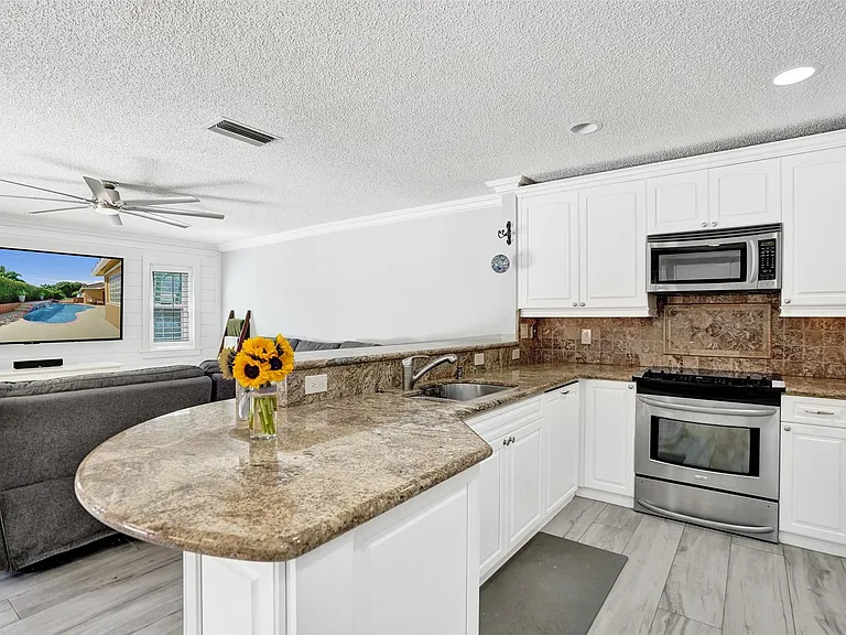 4142 NW 58th Dr — Photo 23