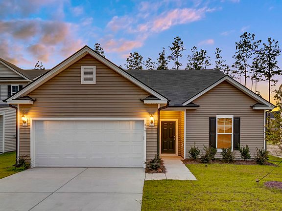 Compton New Home Exterior LC1A with covered front door.