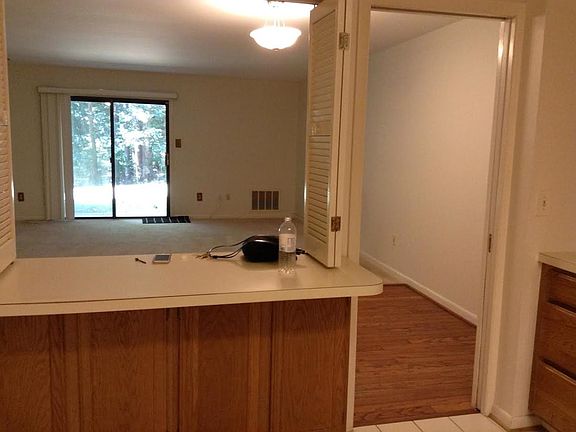 View from kitchen into dining room and living room
