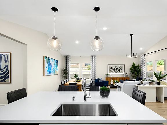 Kitchen with pendant lighting and chrome faucet
