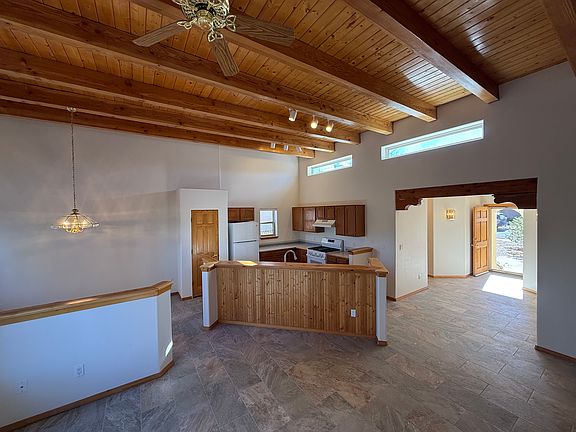 View of the kitchen and dining area from the fireplace