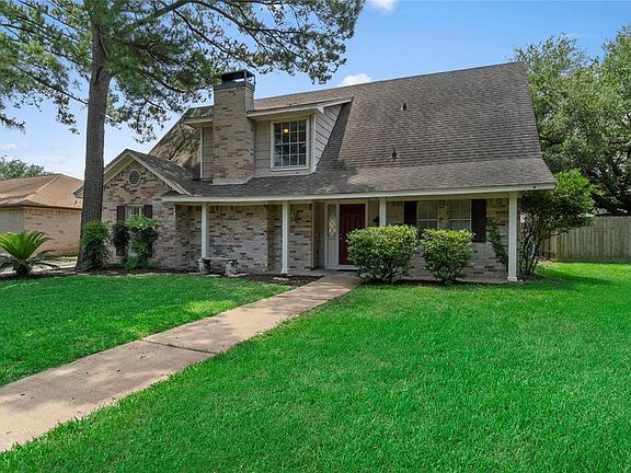 Covered front porch is a perfect place to sip iced tea and chat with your neighbors