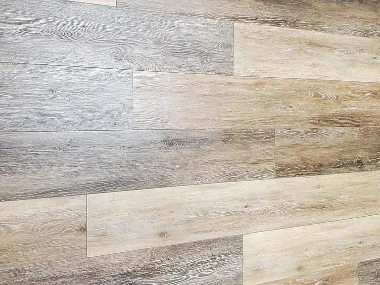 New luxury LVP planks being installed on first floor.