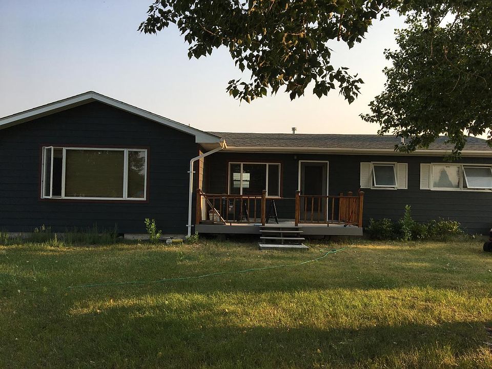 front yard, meadow in back