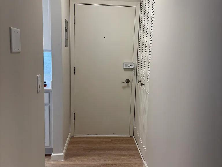 Hallway of entry to condo