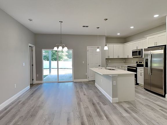 3rd image of 7669 N Paris Dr