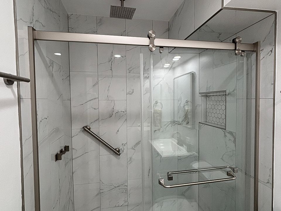 One of two rainshower bathrooms.