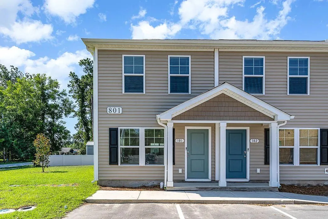Coastal Wind Townhomes — Photo 1