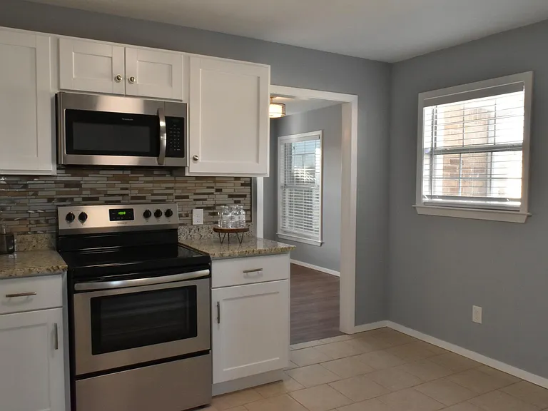 Kitchen leading to living room