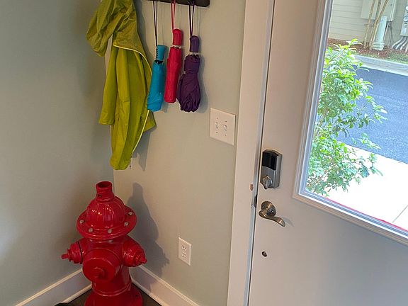 Ground floor: The front door entry, garage access, spacious coat and shoe closet.