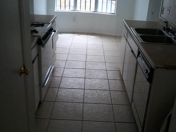 Galley kitchen with breakfast nook