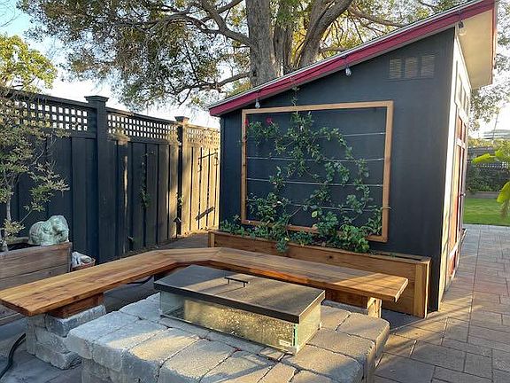 Gather on these custom redwood benches around the gas firepit for fun conversations anytime of the day, but especially after the sun goes down!
