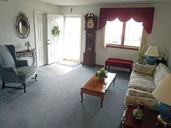 Formal Living Room w/ tile entry & newer carpet