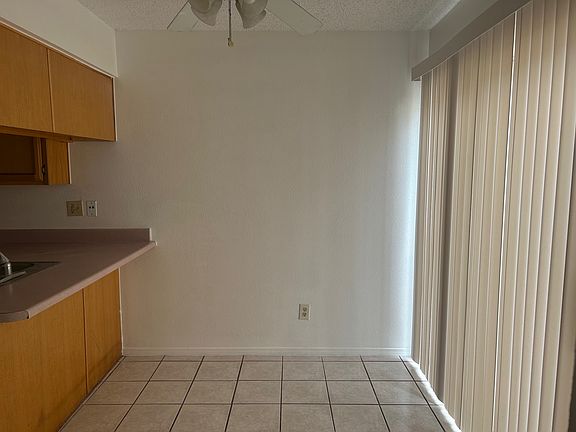 Dining area connected to kitchen. Exit to very small brick patio.