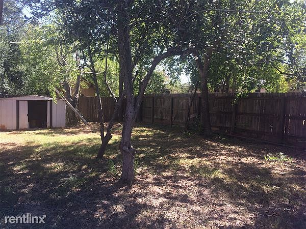 Large Yard with Storage Shed